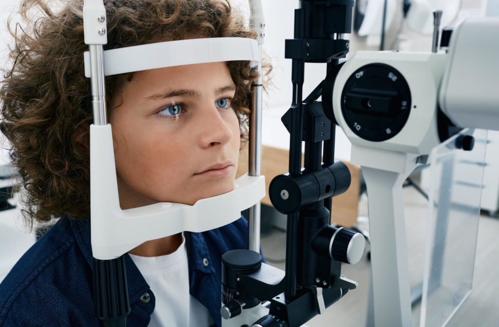 A young boy undergoing an eye exam.